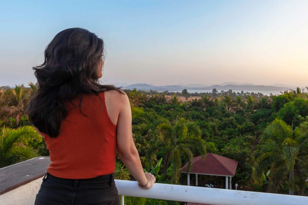 StayVista at Mango and Wine with a beautiful view of the mango plantations .