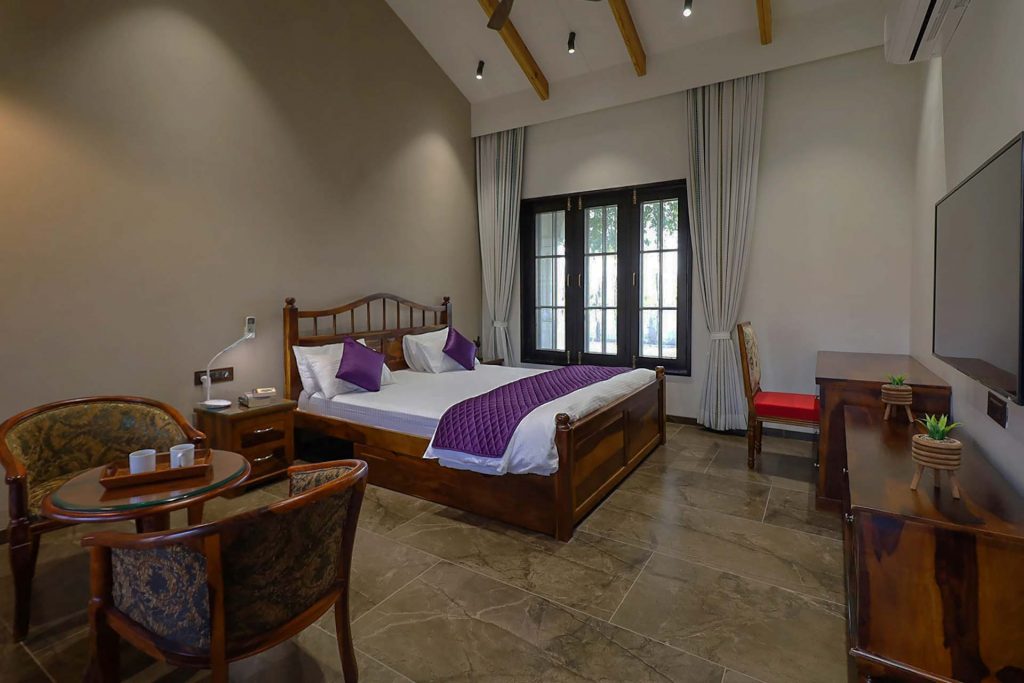 Bedroom at StayVista Desert Palms