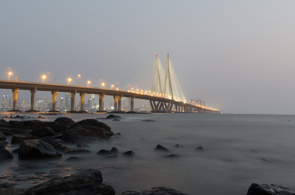 Admire the shimmering skyline, glistening waves and the sea link.