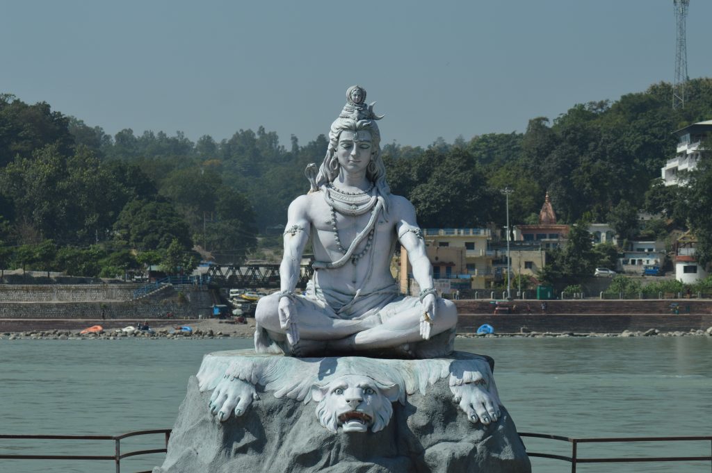 shiva idol floating on water in rishikesh