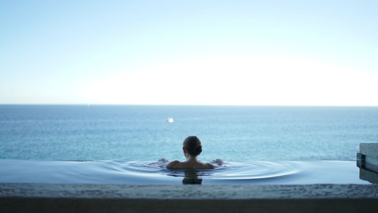 enjoying view from infinity pool villa