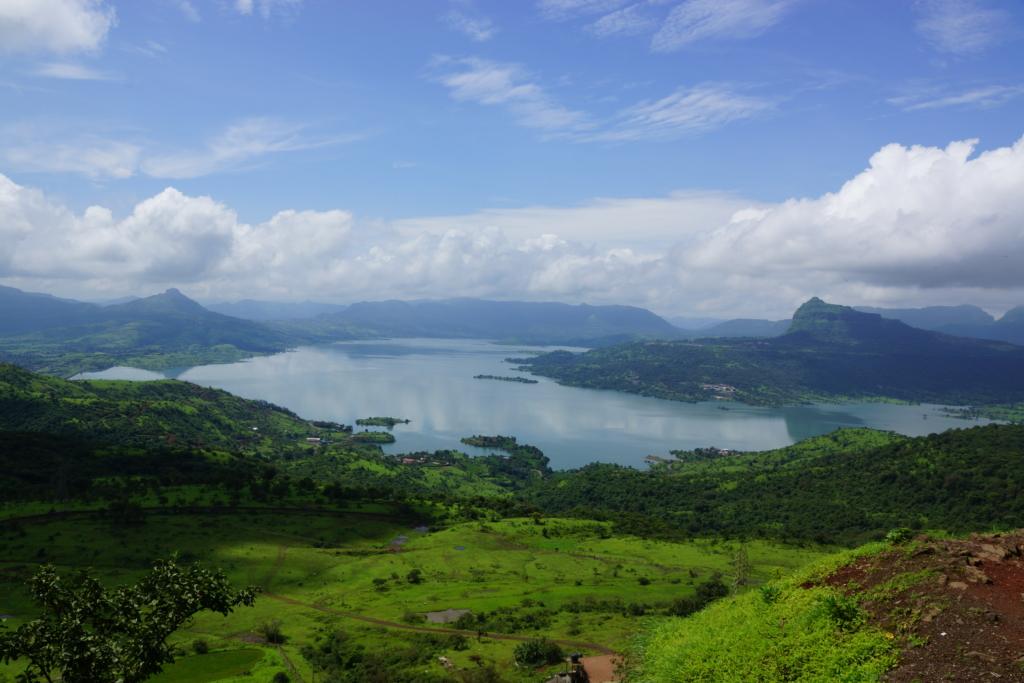 Trekking trail leading to Lohagad Fort with panoramic views of Lonavala hills