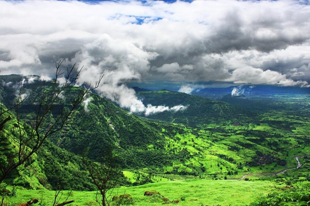 Scenic landscape of dense forests and hills seen from Louisa Point in Matheran, a tourist place to visit in winter