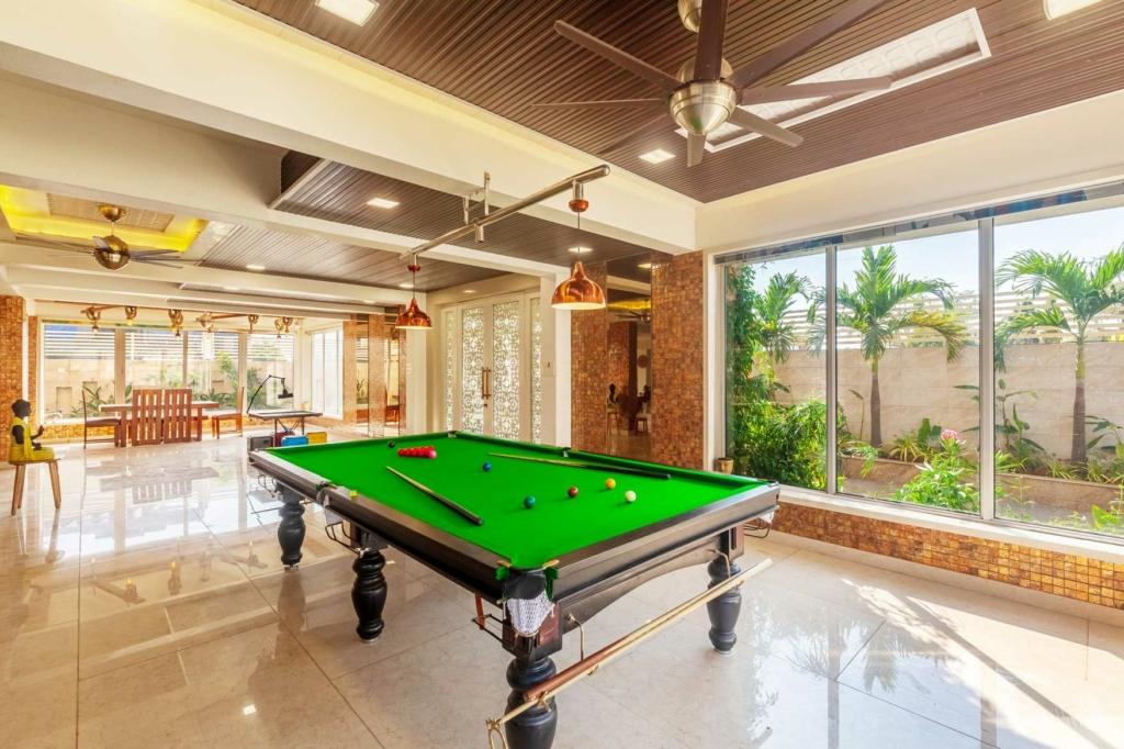 Outdoor swimming pool at family-friendly villa in Lonavala