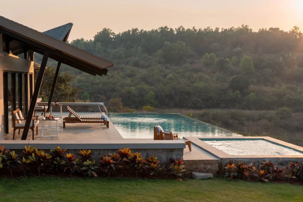 Family enjoying outdoor dining at private villa in Lonavala