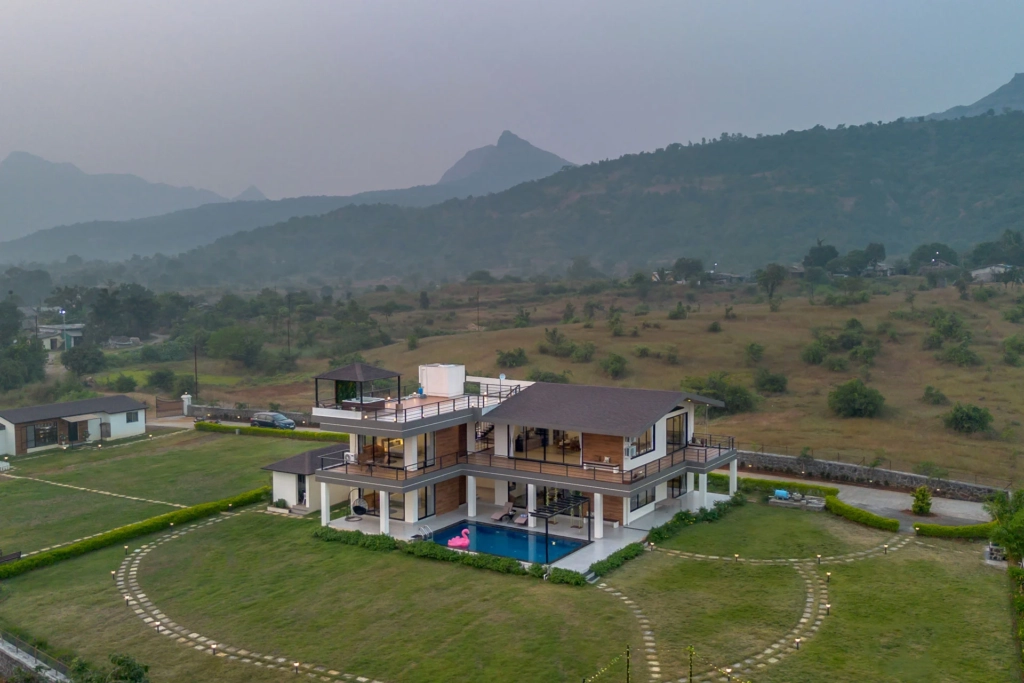 Cozy fireplace corner in family villa retreat at Lonavala