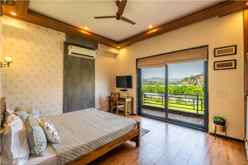 Elegant white exterior of Shivoham Farms villa near Delhi