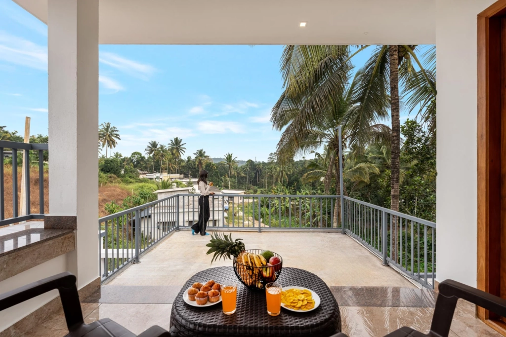 Monsoon view of misty hills and homestays in South India