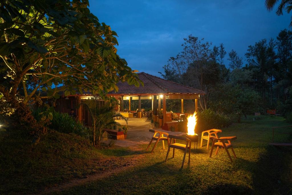 Scenic view of a villa nestled in the hills during monsoon in South India