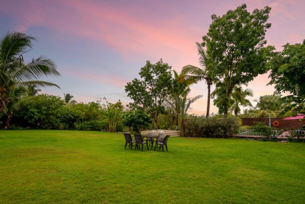 Modern villa with panoramic mountain views and an inviting terrace overlooking nature.