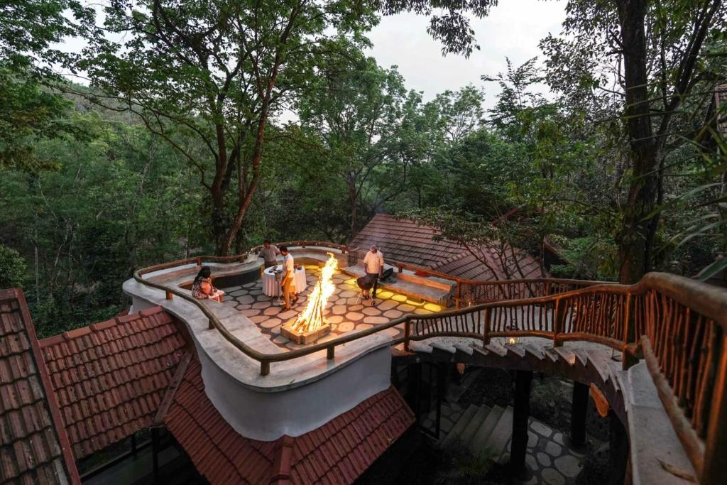 Scenic villa surrounded by misty hills, perfect for monsoon treks for kids nearby