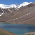 Chandratal Lake (Moon Lake) shimmering in blue at 4,300m altitude in Spiti Valley