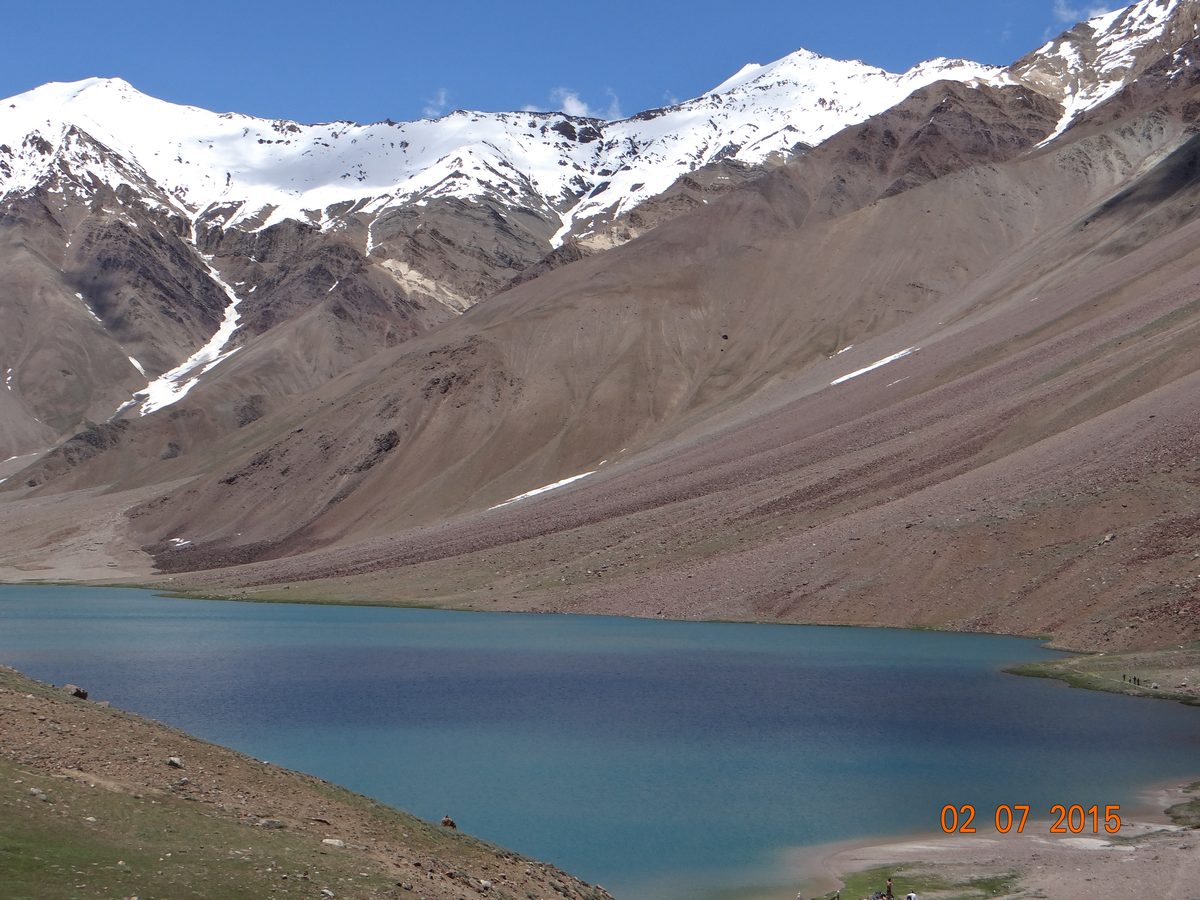 Chandratal Lake (Moon Lake) shimmering in blue at 4,300m altitude in Spiti Valley