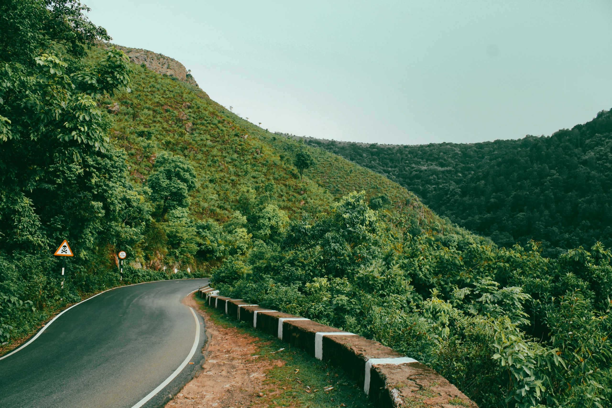 Winding road climbing through lush Araku Valley in Andhra Pradesh in May 2026